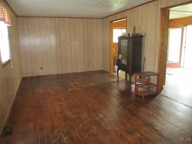 3574 Mountain Road Slatington, PA 18080 - Photo 3 of 8 a view of a livingroom with wooden floor and a window