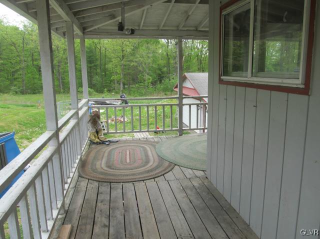 3574 Mountain Road Slatington, PA 18080 - Photo 7 of 8 a view of balcony with wooden floor and outdoor space