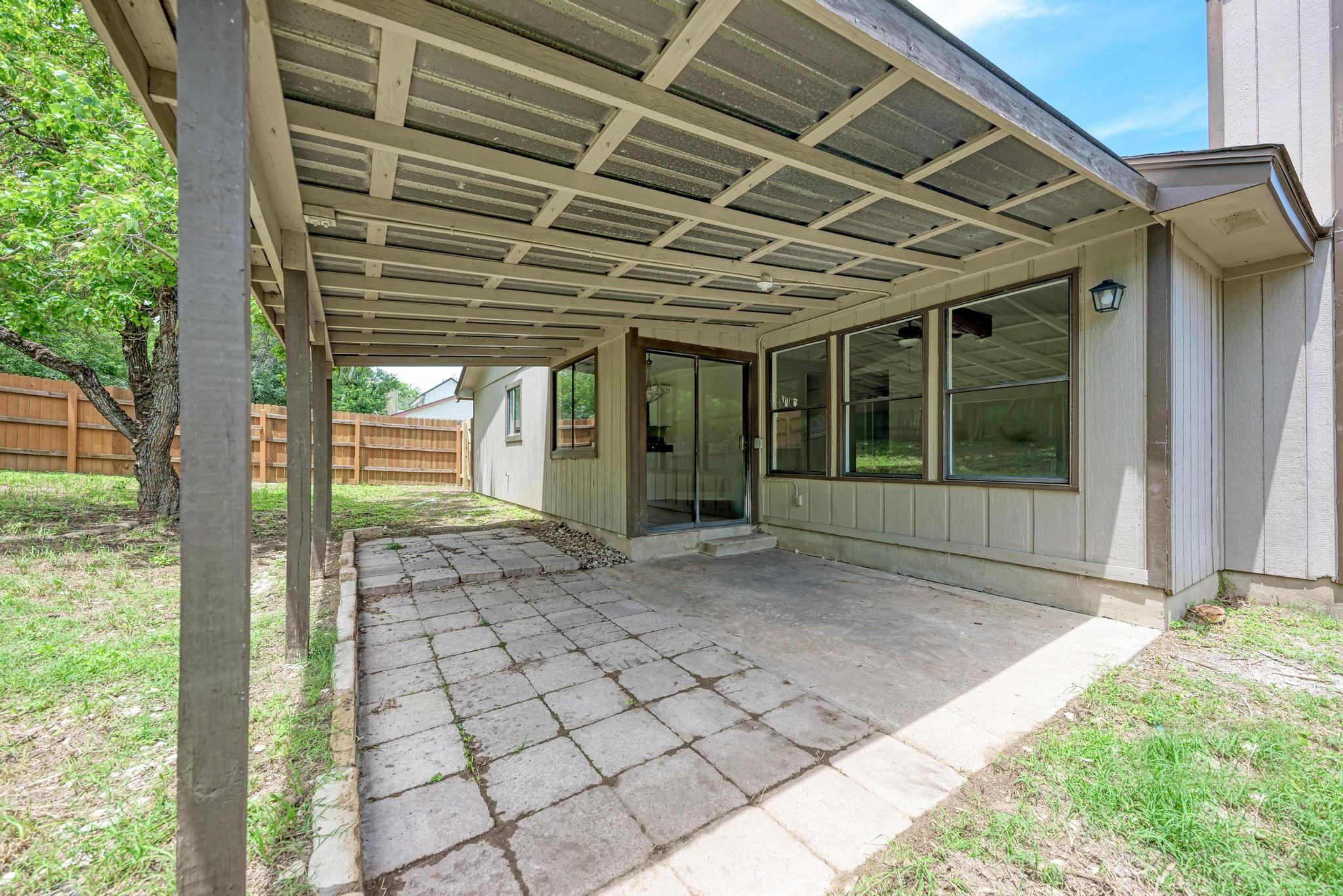 12108 Carnforth Drive Austin, TX 78753 - Photo 29 of 33 a view of a porch with a backyard
