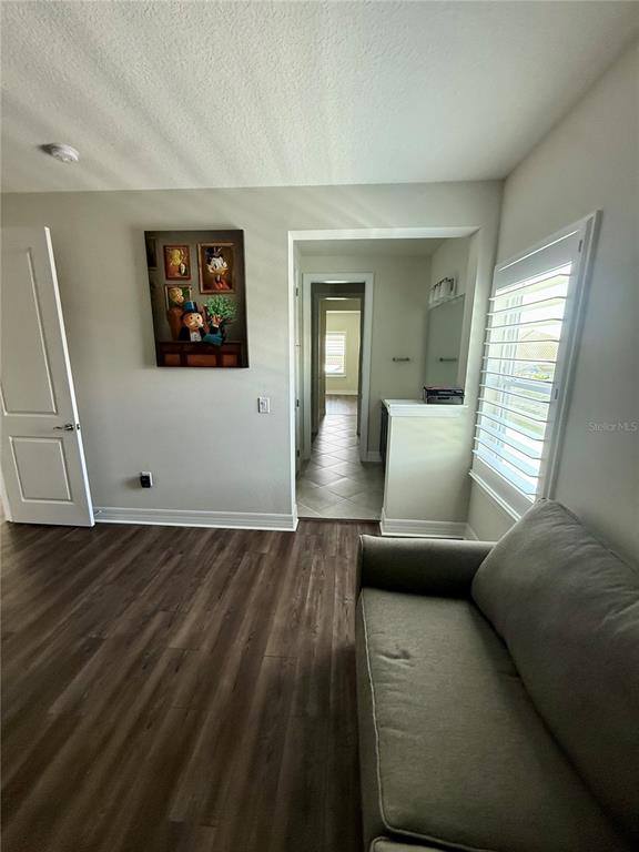 8441 Pk Clf Way Orlando, FL 32836 - Photo 26 of 59 a living room with furniture and a couch