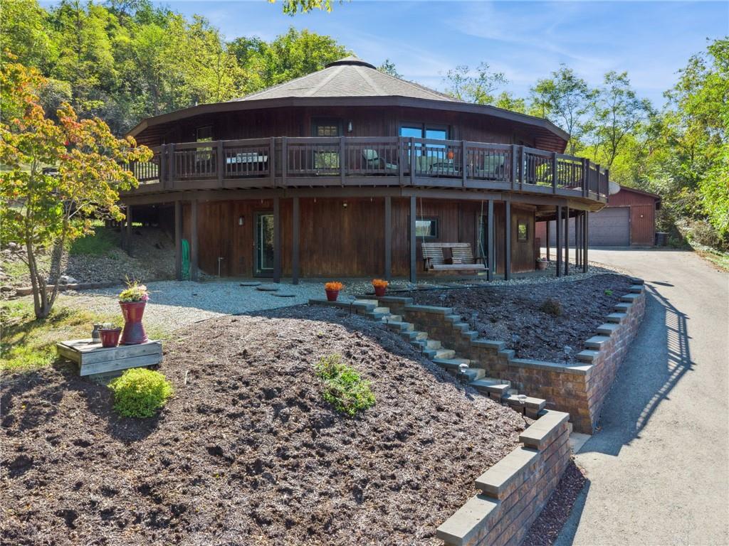 50 Potato Run Road Washington, PA 15301 - Photo 1 of 43 a front view of a house with garden