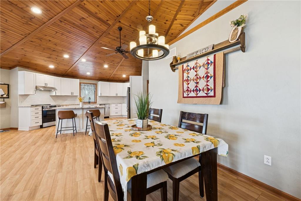 50 Potato Run Road Washington, PA 15301 - Photo 12 of 43 a view of a dining room with furniture and wooden floor