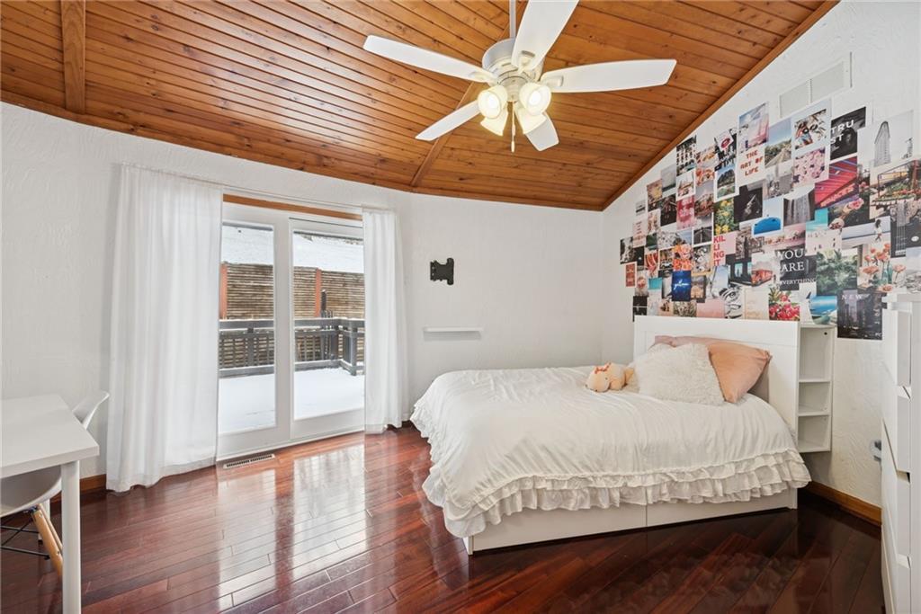 50 Potato Run Road Washington, PA 15301 - Photo 19 of 43 a bedroom with a large bed and a large window