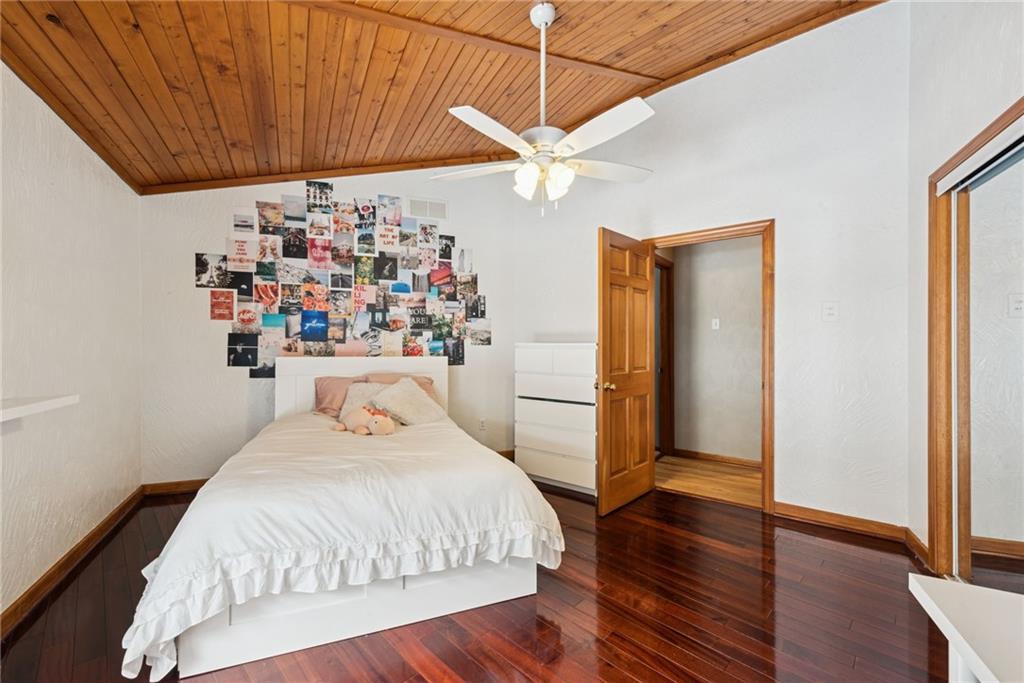 50 Potato Run Road Washington, PA 15301 - Photo 20 of 43 a bedroom with a bed and wooden floor