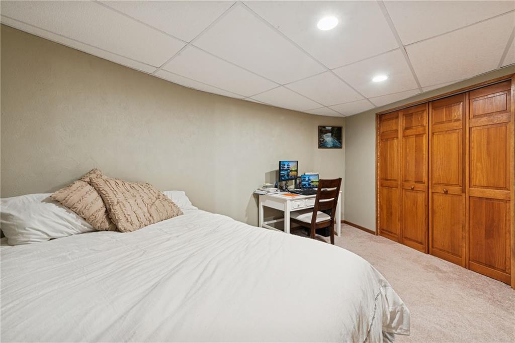 50 Potato Run Road Washington, PA 15301 - Photo 27 of 43 a bedroom with a bed and a table in it