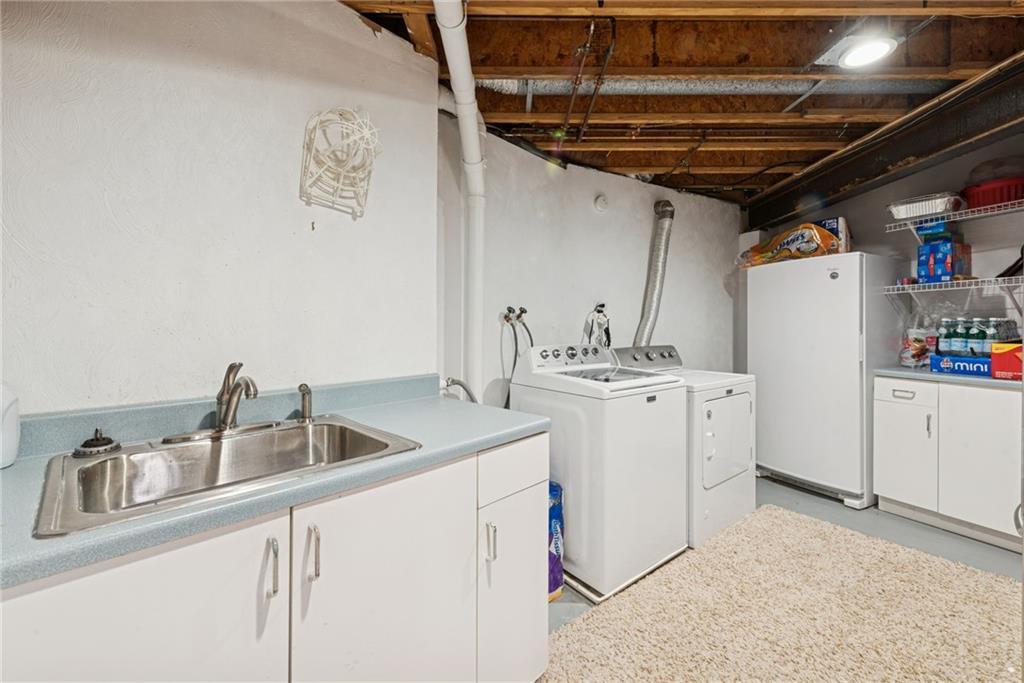 50 Potato Run Road Washington, PA 15301 - Photo 29 of 43 a utility room with dryer and washer