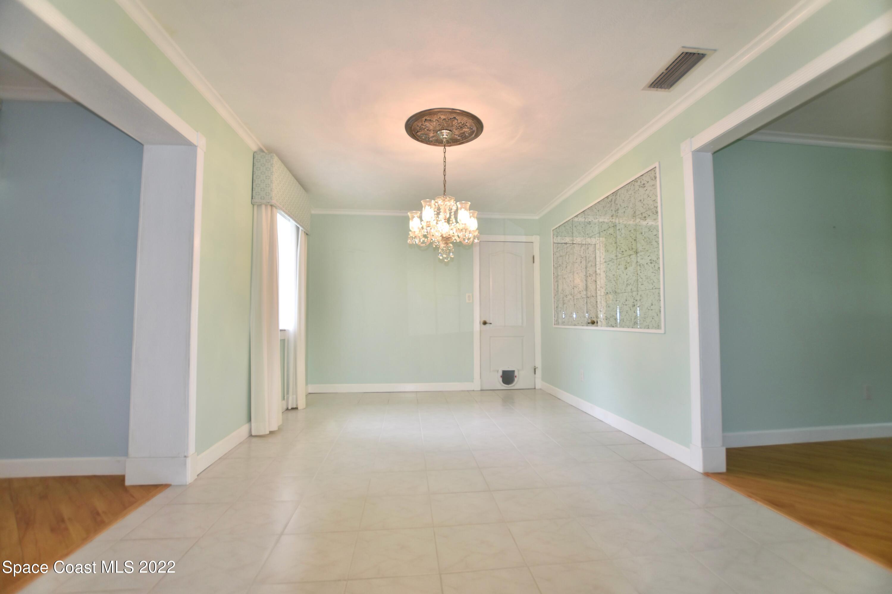 977 Kings Post Road Rockledge, FL 32955 - Photo 5 of 32 11