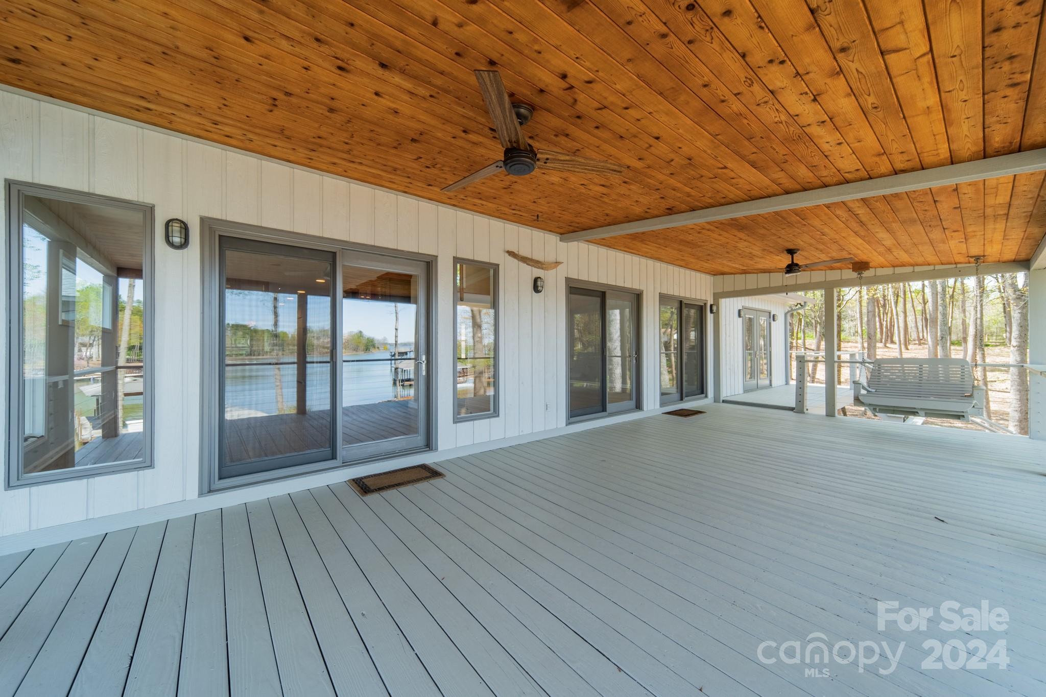 114 Stonemarker Road Mooresville, NC 28117 - Photo 11 of 38 a empty room with wooden floor and balcony
