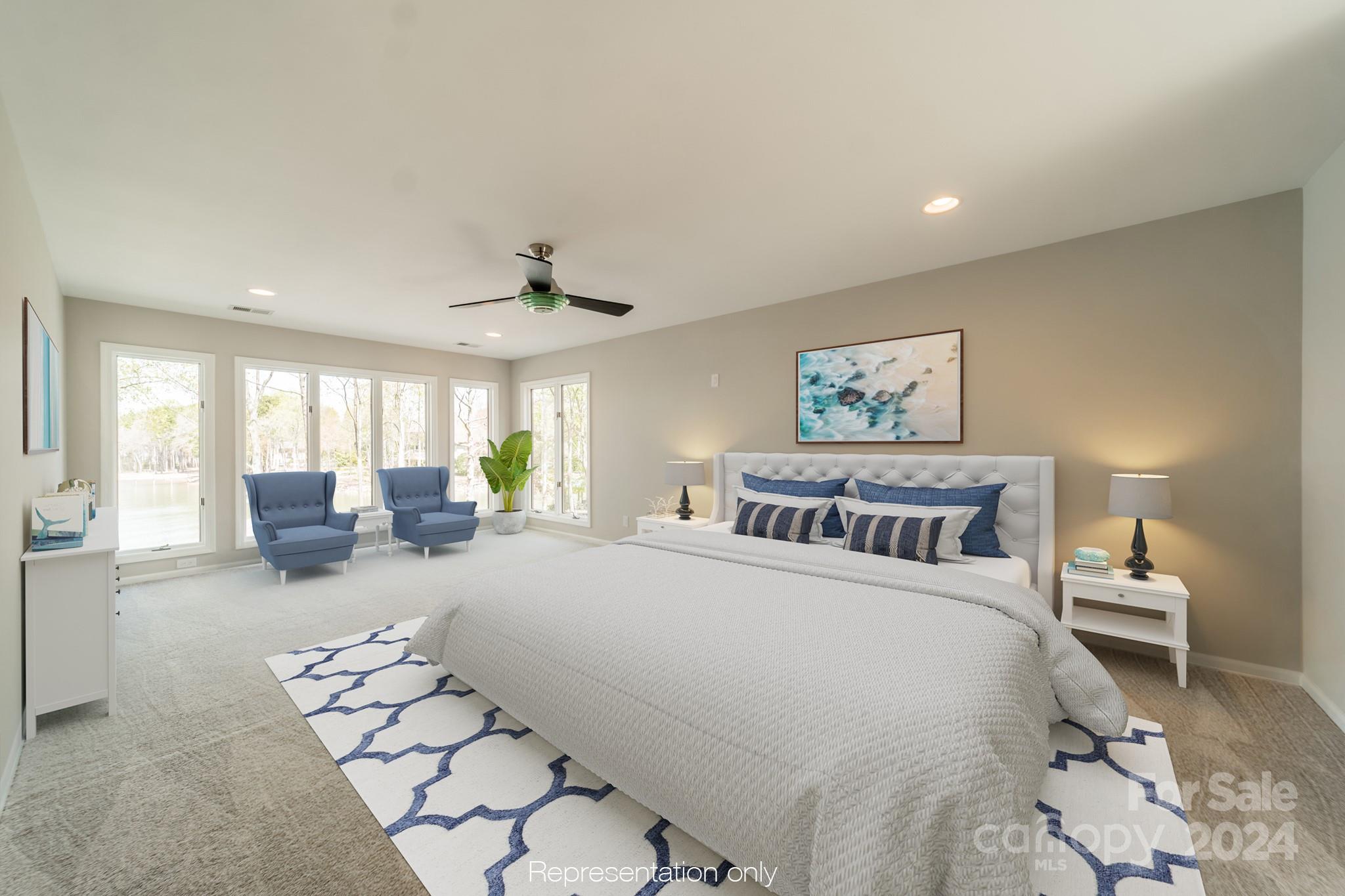 114 Stonemarker Road Mooresville, NC 28117 - Photo 24 of 38 a large bedroom with a bed and glass windows