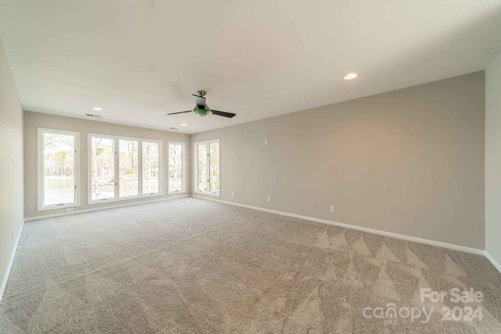 114 Stonemarker Road Mooresville, NC 28117 - Photo 25 of 38 a view of an empty room with a window