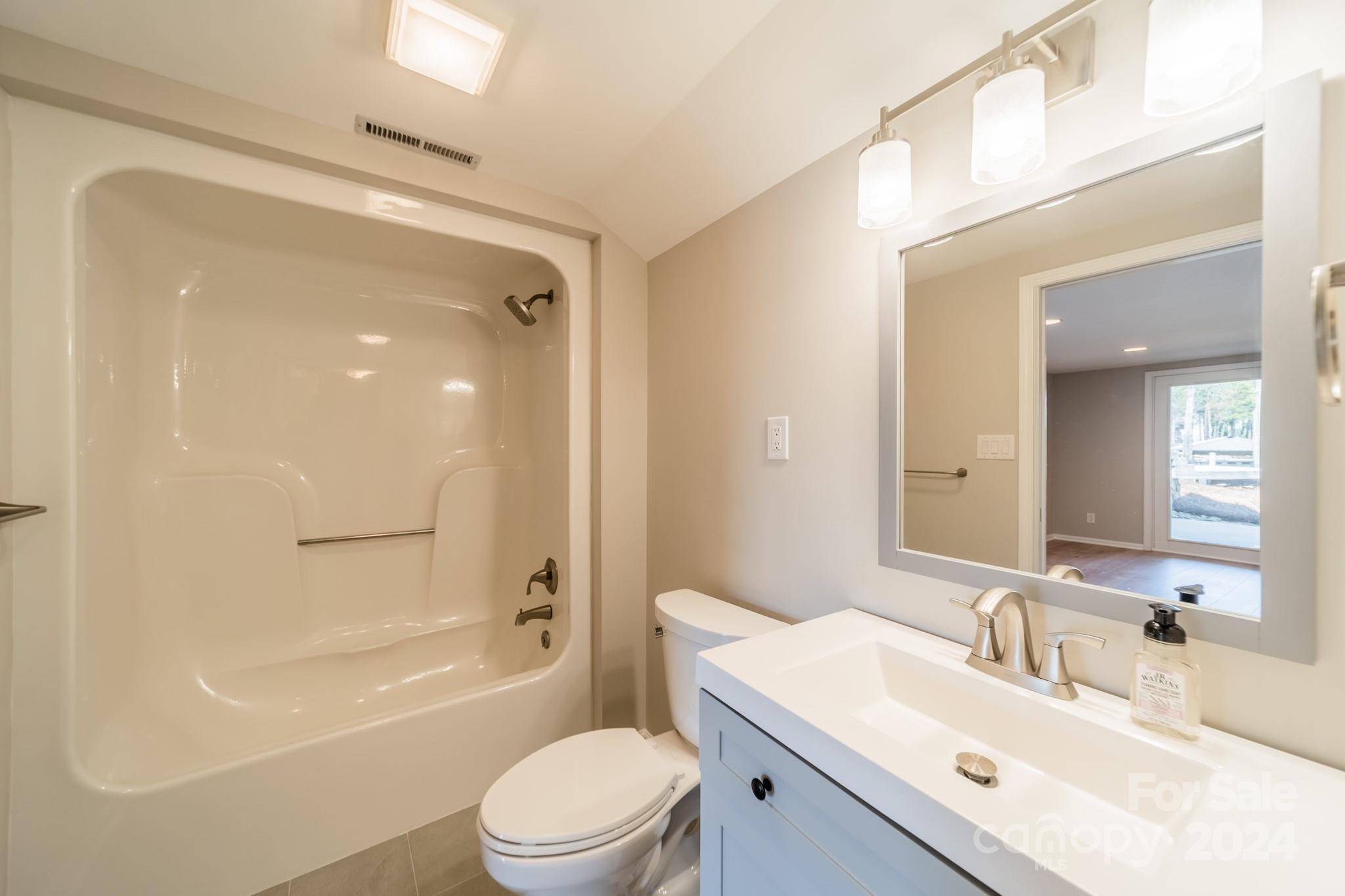 114 Stonemarker Road Mooresville, NC 28117 - Photo 33 of 38 a bathroom with a sink a toilet and shower