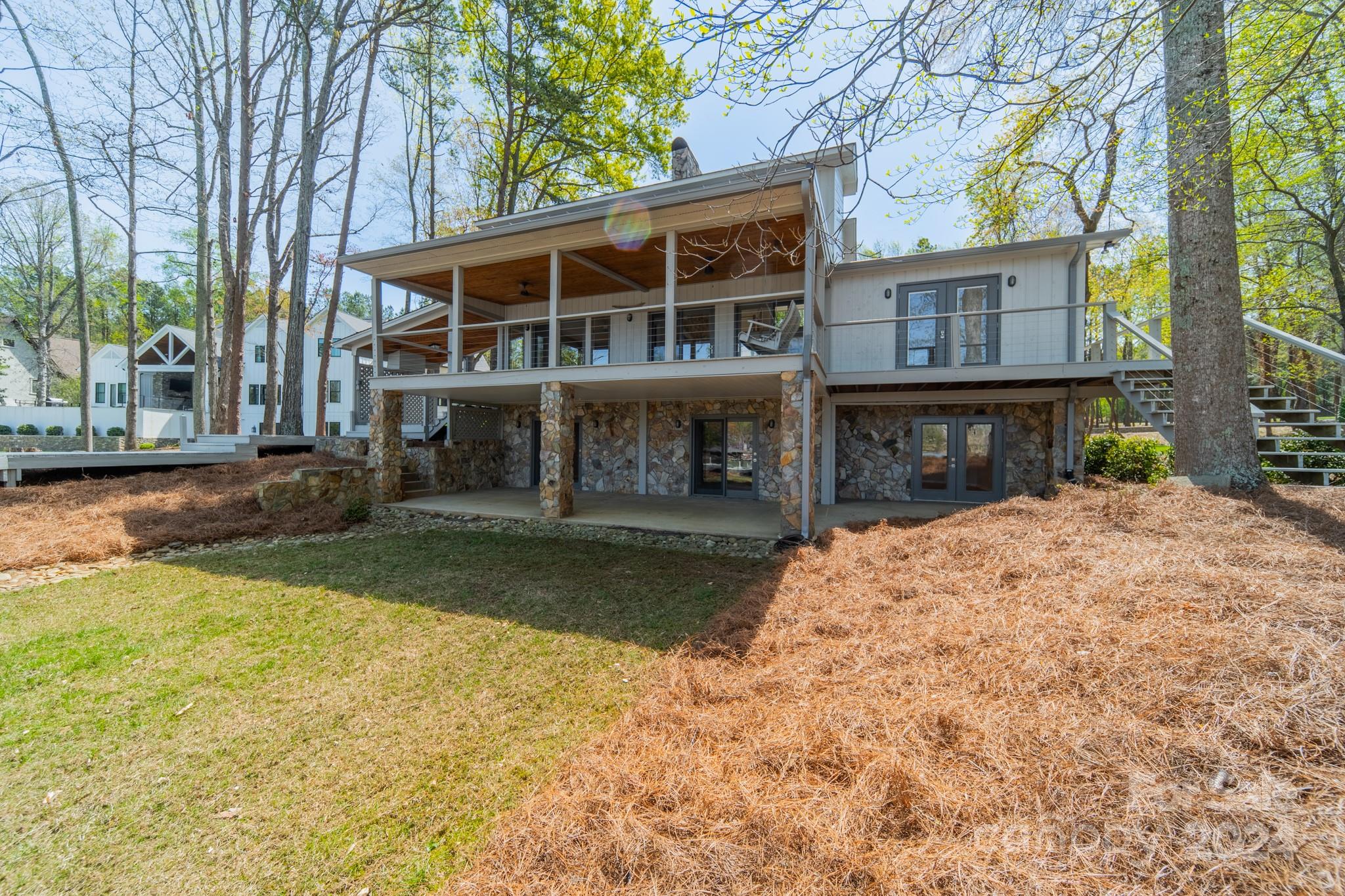 114 Stonemarker Road Mooresville, NC 28117 - Photo 34 of 38 a front view of a house with a yard table and chairs