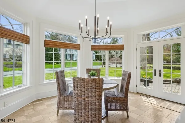 a kitchen with cabinets and window