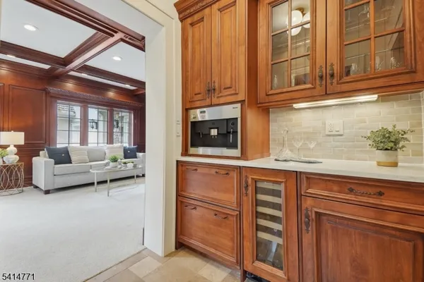 a kitchen with a sink and a stove top oven