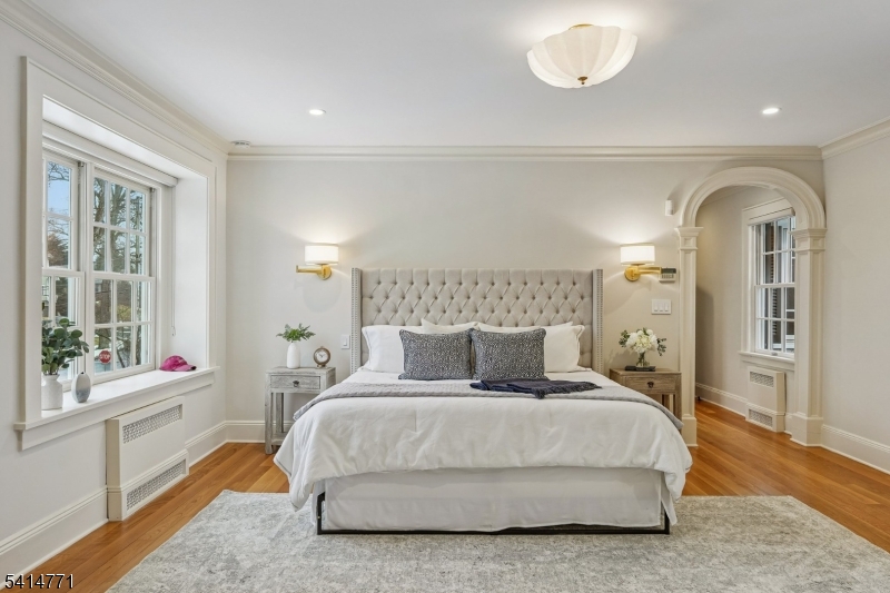 55 Oxbow Lane Summit, NJ 07901 - Photo 22 of 50 a bedroom with a bed and a large window