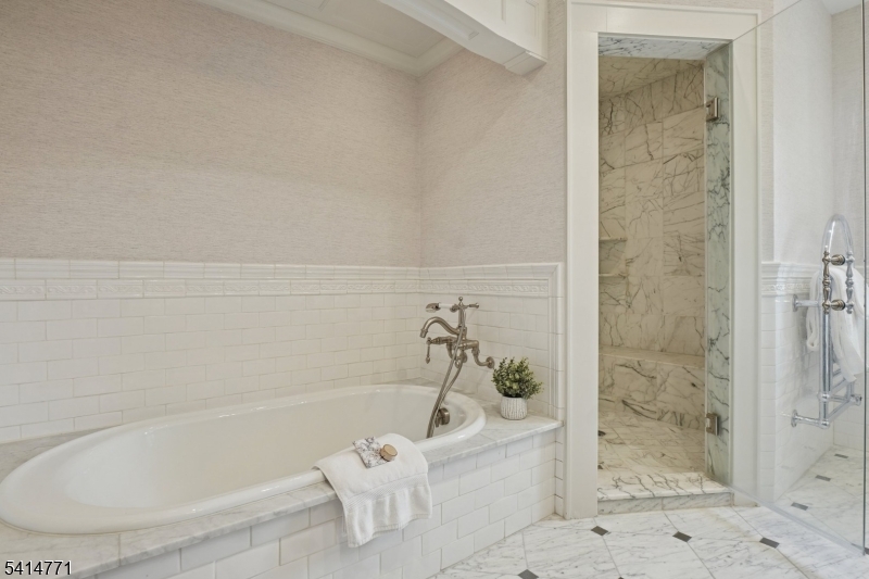 55 Oxbow Lane Summit, NJ 07901 - Photo 24 of 50 a bathroom with a bathtub and a shower