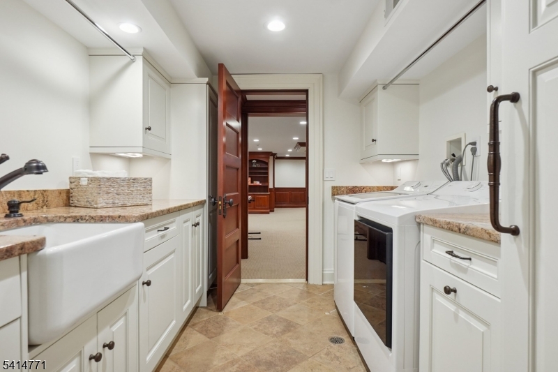 55 Oxbow Lane Summit, NJ 07901 - Photo 39 of 50 a kitchen with granite countertop a sink stove and refrigerator
