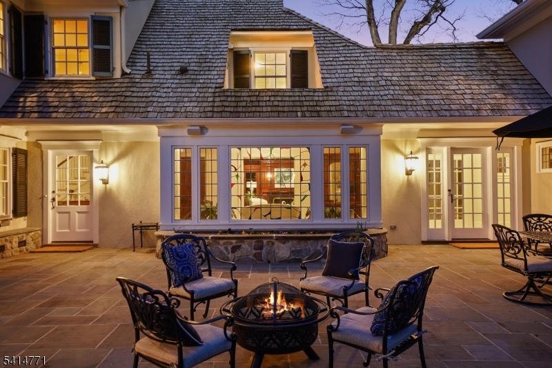 55 Oxbow Lane Summit, NJ 07901 - Photo 44 of 50 a patio with table and chairs