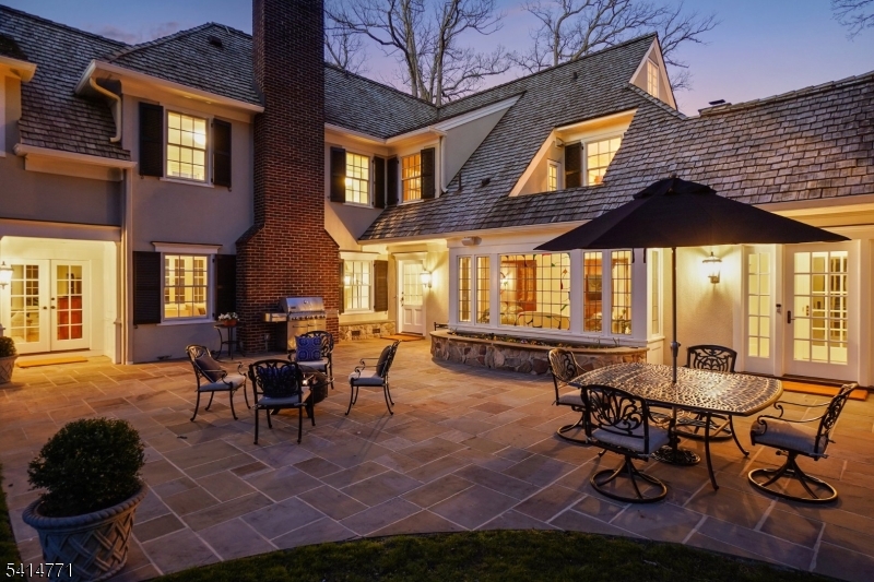 55 Oxbow Lane Summit, NJ 07901 - Photo 45 of 50 a view of a dining room with furniture and chandelier