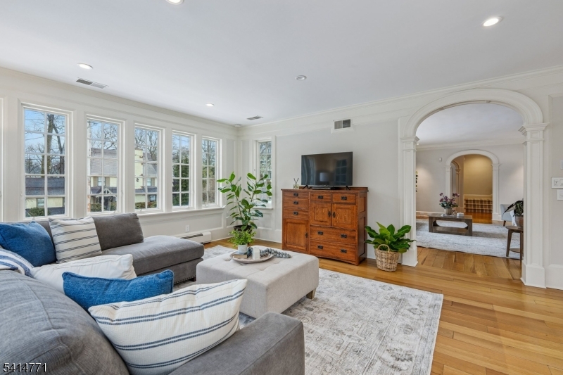 55 Oxbow Lane Summit, NJ 07901 - Photo 7 of 50 a living room with furniture and a large window