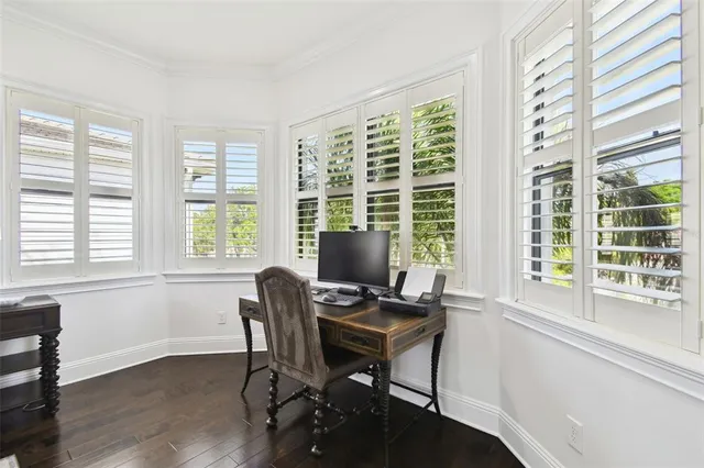 a workspace with furniture and a window