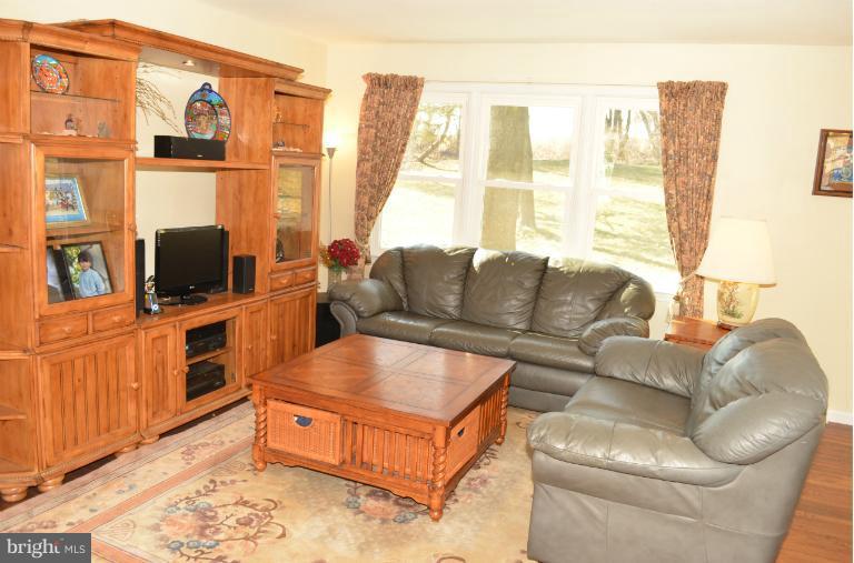 1023 Bosley Road Cockeysville, MD 21030 - Photo 4 of 24 Bright and Spacious Living Room with Hardwoods