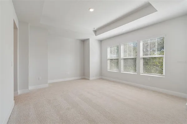 an empty room with a empty space and a window