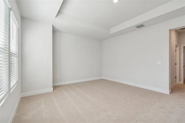 a bathroom with a shower sink and mirror
