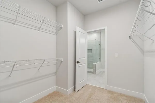 a view of a room with racks on the wall