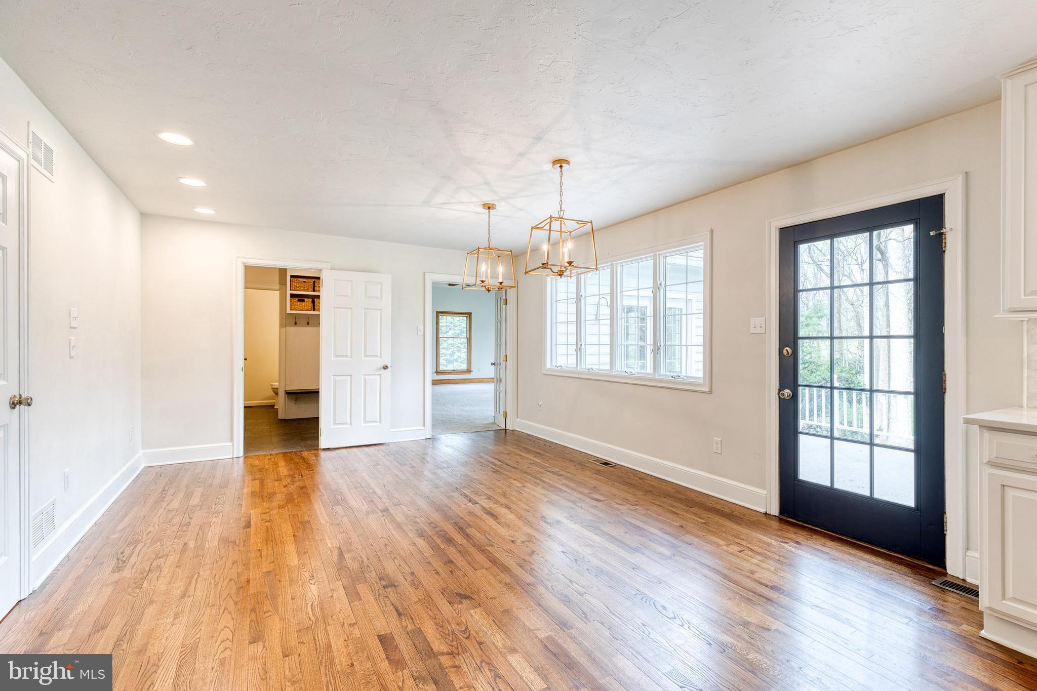 1216 Bonaire Road Forest Hill, MD 21050 - Photo 19 of 71 an empty room with wooden floor and windows