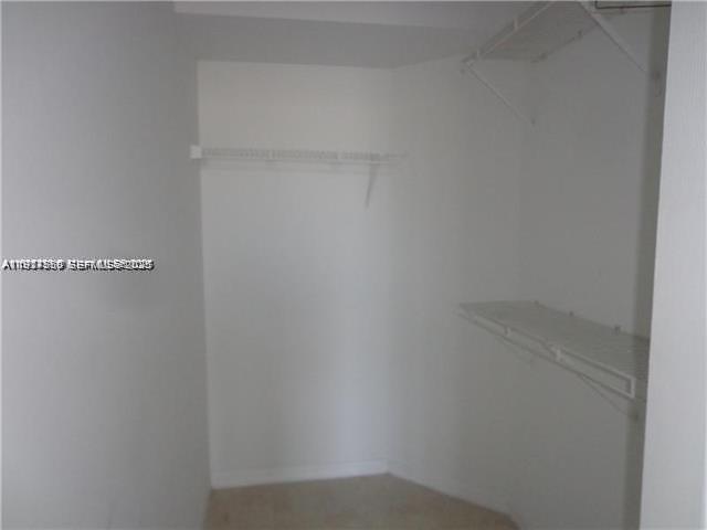 720 Southwest 111th Avenue, Unit 207 Pembroke Pines, FL 33025 - Photo 7 of 13 close up of a white marble wall