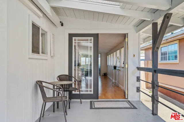 a room with table and chairs