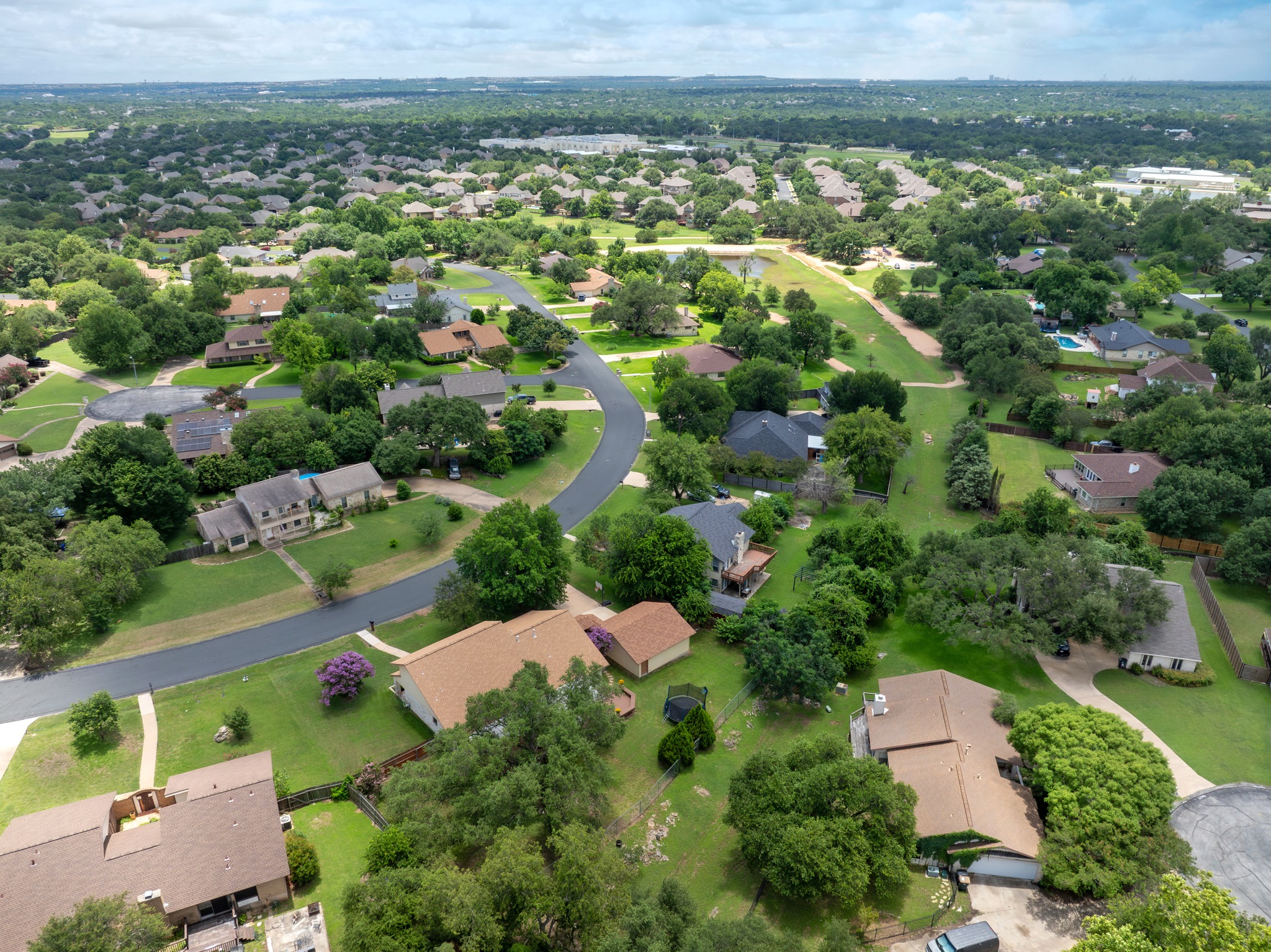3908 Valley View Round Rock, TX 78681 - Photo 32 of 39 Aerial views show off the oversized lot, mature trees, and the close proximity to Brushy Creek North Park, with a playscape, walking track connected to miles of trails, etc. All just a minutes walk away!