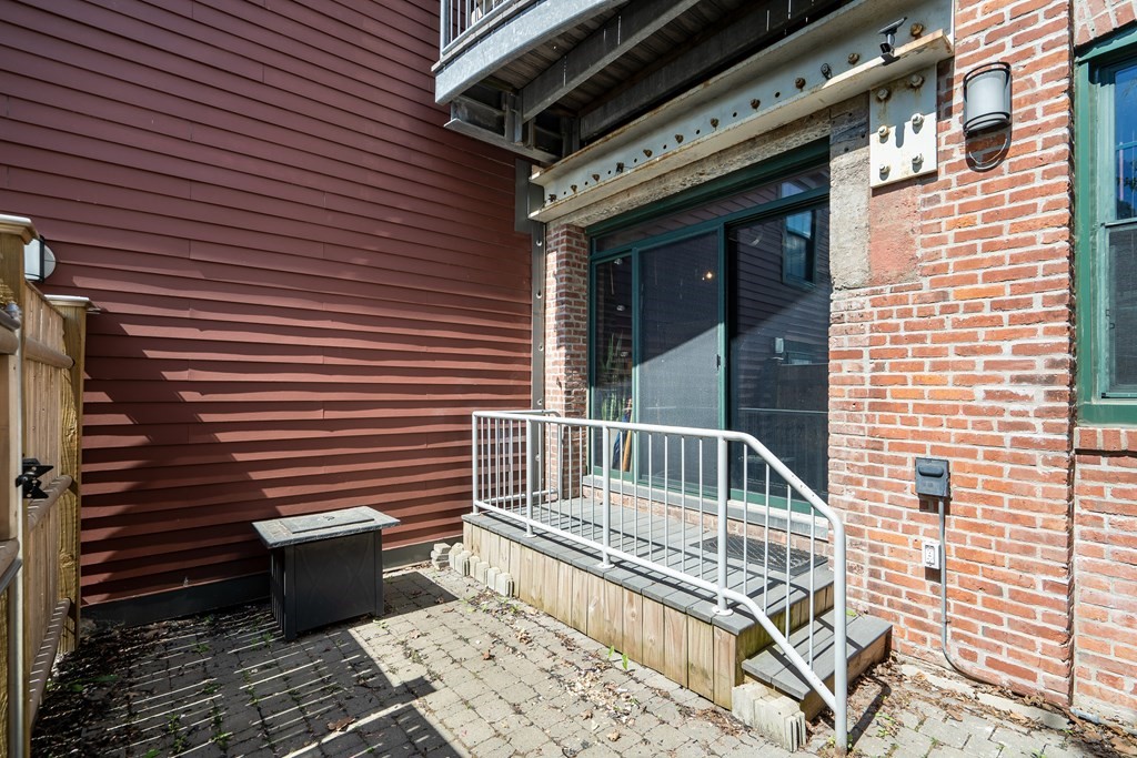 210 Broadway, Unit 103 Everett, MA 02149 - Photo 15 of 16 a view of entryway with a balcony