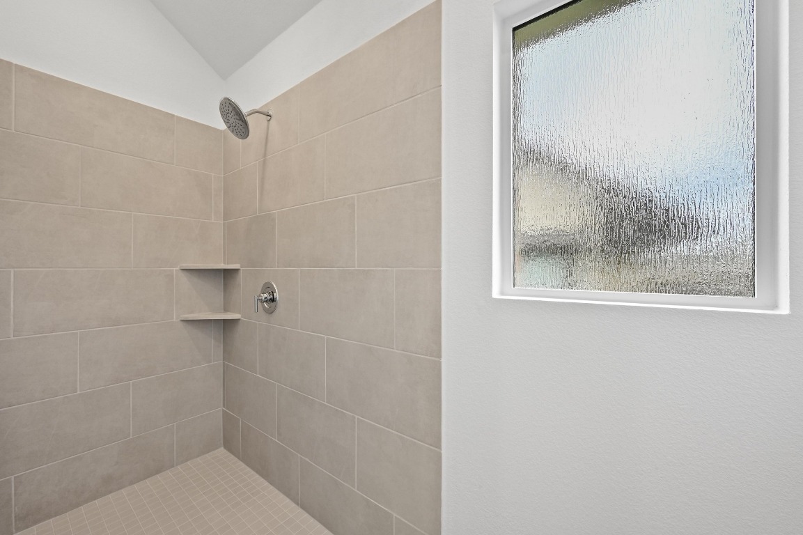 1613 Dove Rnch Road Georgetown, TX 78628 - Photo 10 of 29 a bathroom with a shower