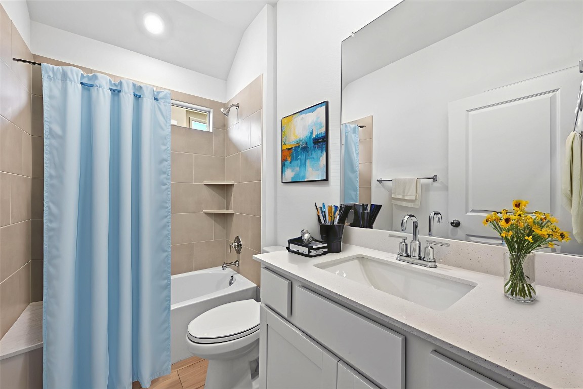 1613 Dove Rnch Road Georgetown, TX 78628 - Photo 13 of 29 a bathroom with a sink toilet and shower