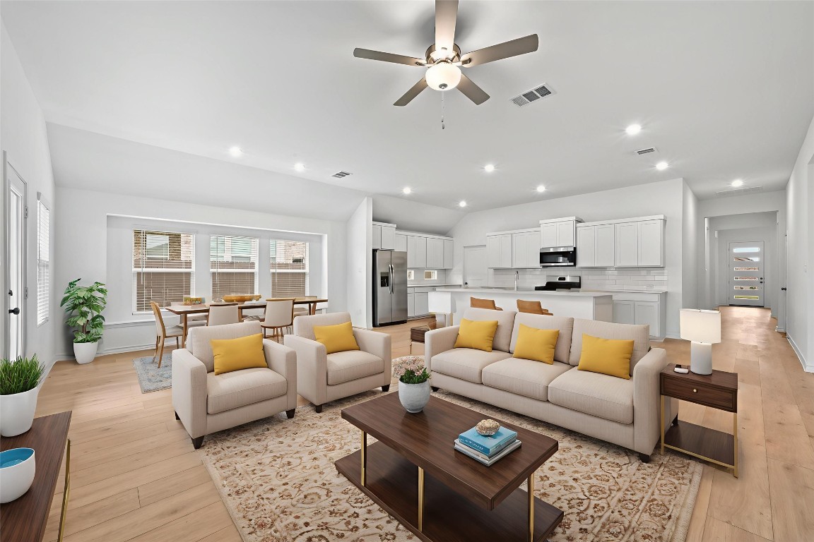 1613 Dove Rnch Road Georgetown, TX 78628 - Photo 3 of 29 a living room with furniture kitchen view and a large window