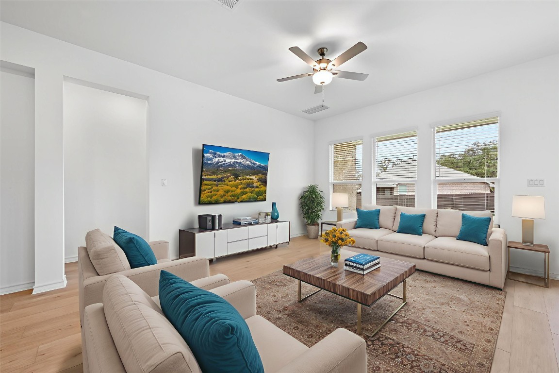 1613 Dove Rnch Road Georgetown, TX 78628 - Photo 7 of 29 a living room with furniture and a large window