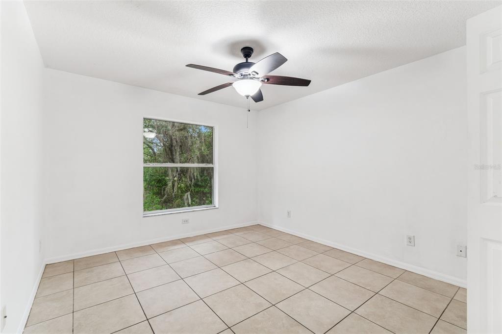 14 South Charles Avenue Inverness, FL 34453 - Photo 17 of 25 a view of an empty room with a window