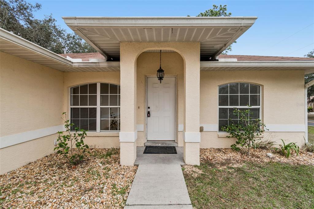 14 South Charles Avenue Inverness, FL 34453 - Photo 3 of 25 a front view of a house