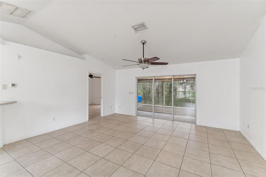 14 South Charles Avenue Inverness, FL 34453 - Photo 8 of 25 a view of an empty room with a window
