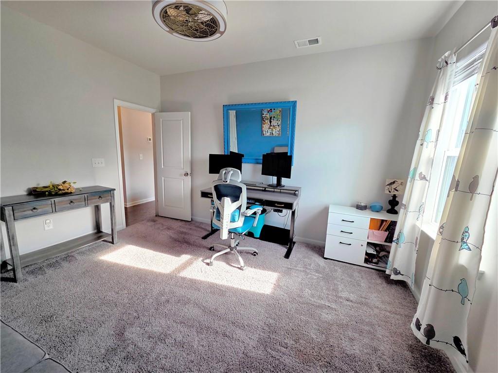 3042 Lowell Road Bethlehem, GA 30620 - Photo 24 of 53 a view of a workspace with furniture and a window