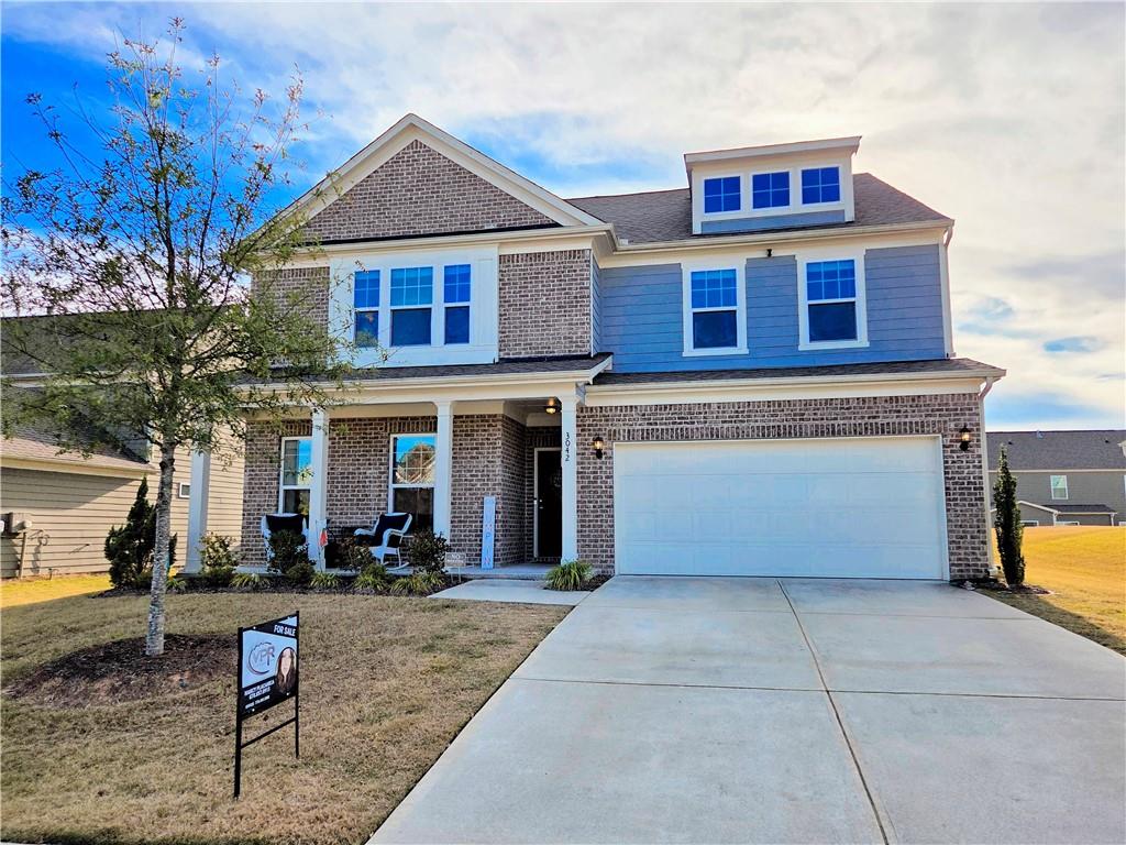 3042 Lowell Road Bethlehem, GA 30620 - Photo 3 of 53 a front view of a house with garden