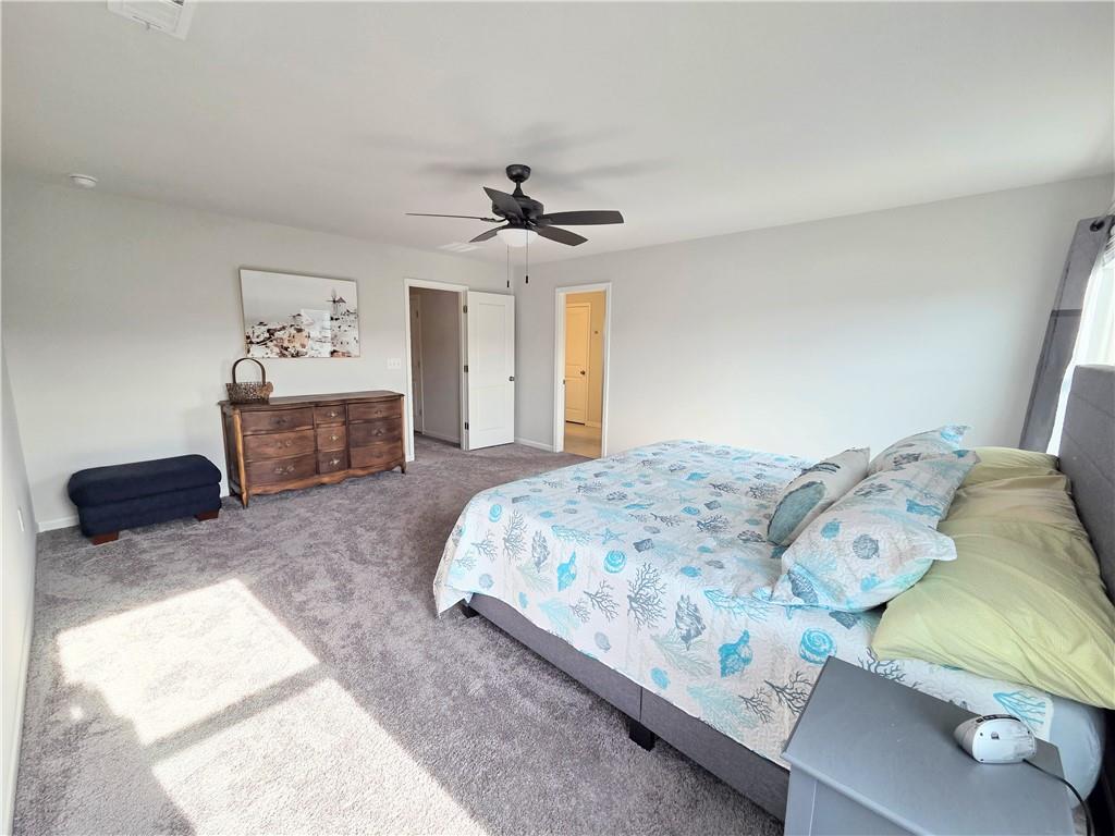 3042 Lowell Road Bethlehem, GA 30620 - Photo 33 of 53 a bedroom with a bed and a dresser