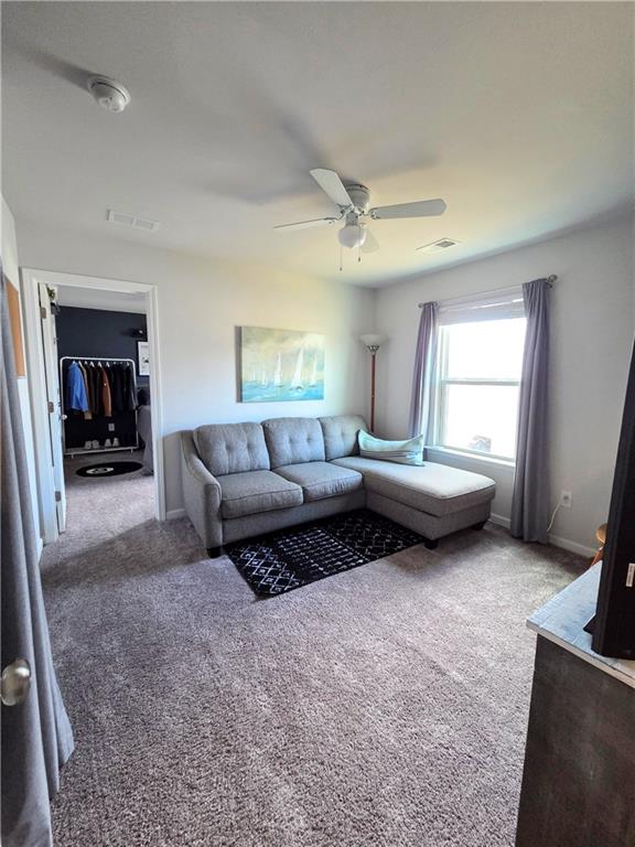 3042 Lowell Road Bethlehem, GA 30620 - Photo 42 of 53 a living room with furniture and a fireplace