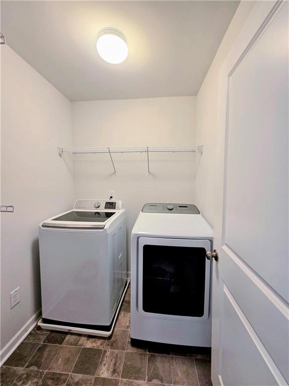 3042 Lowell Road Bethlehem, GA 30620 - Photo 47 of 53 a utility room with dryer and washer
