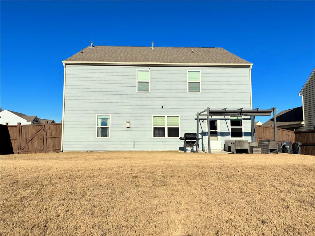 3042 Lowell Road Bethlehem, GA 30620 - Photo 49 of 53 a view of a house with a yard