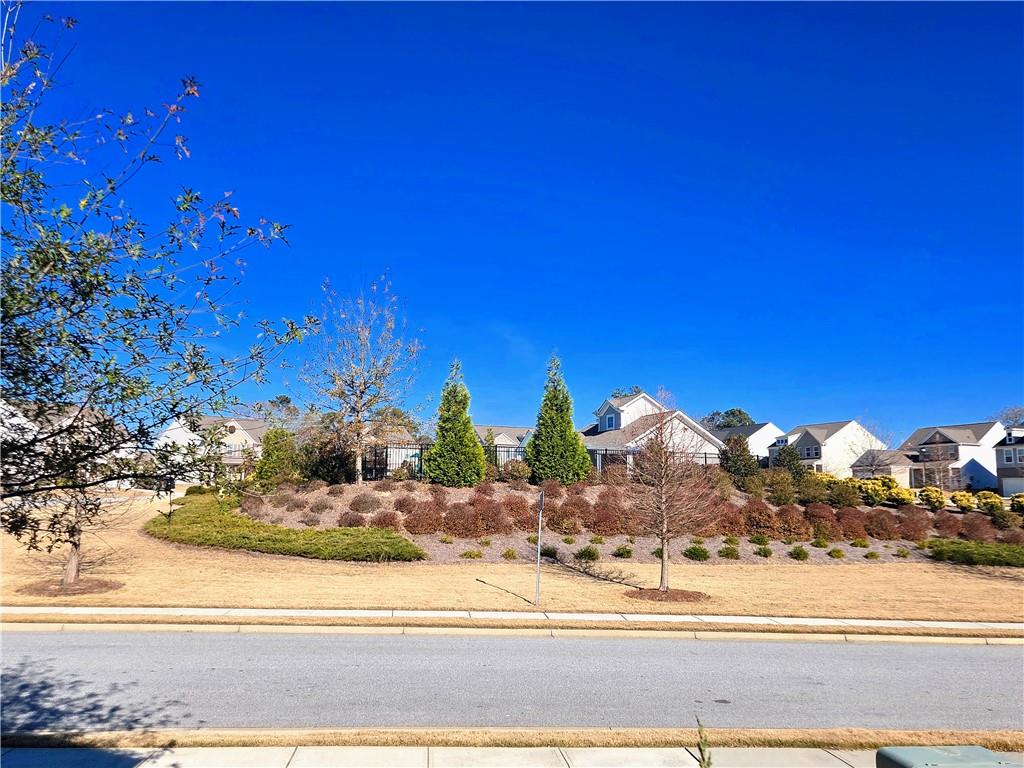 3042 Lowell Road Bethlehem, GA 30620 - Photo 51 of 53 a view of a house with a yard