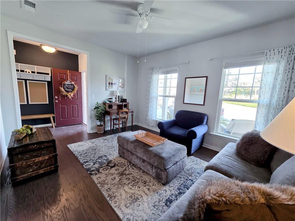 3042 Lowell Road Bethlehem, GA 30620 - Photo 8 of 53 a living room with furniture and a flat screen tv