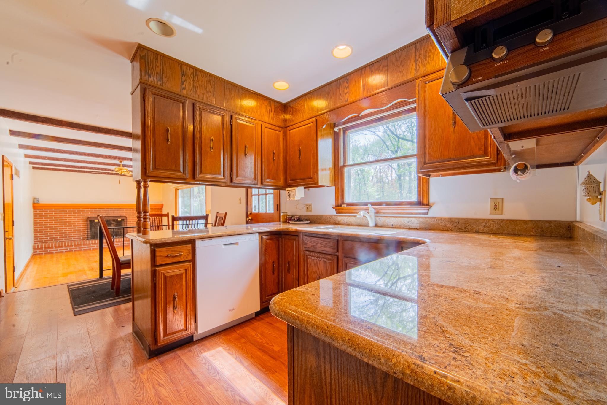 575 Centerton Road Elmer, NJ 08318 - Photo 11 of 28 a kitchen with stainless steel appliances granite countertop wooden cabinets a sink and a stove